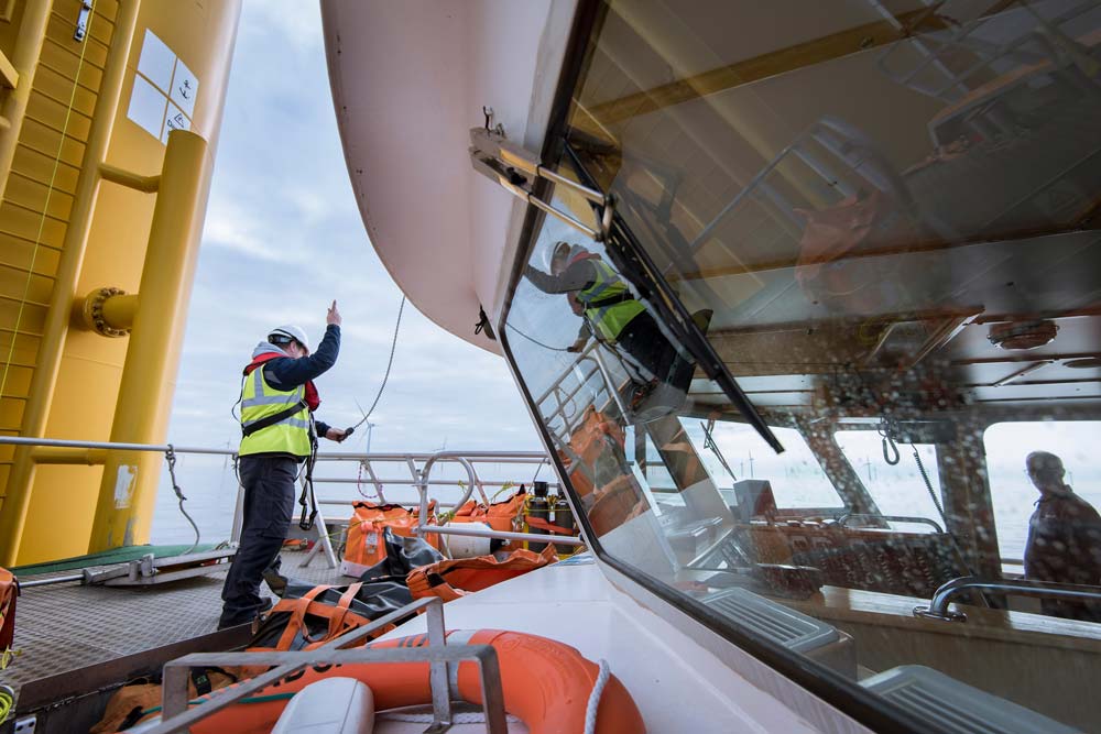 Two men working on boat