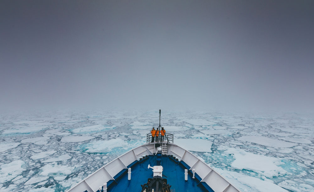 Big ship in water with ice