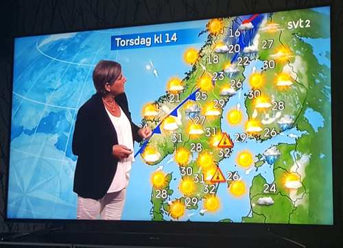 Woman and a forecast weather map.